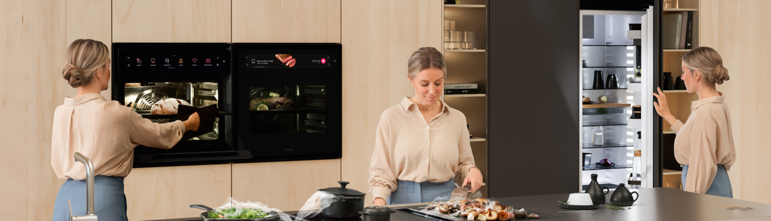 Bilde av et kjøkken med en dame - BORA X BO - BORA Cool og BORA downdraft som illustrerer Stoppe matsvinn - gode tips